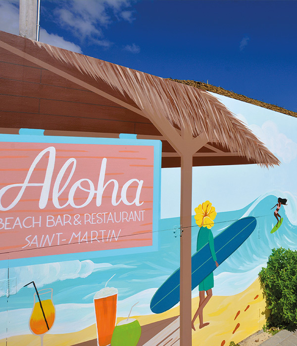 Aloha Beach in Orient Bay, perfect for enjoying lunch by the sea.